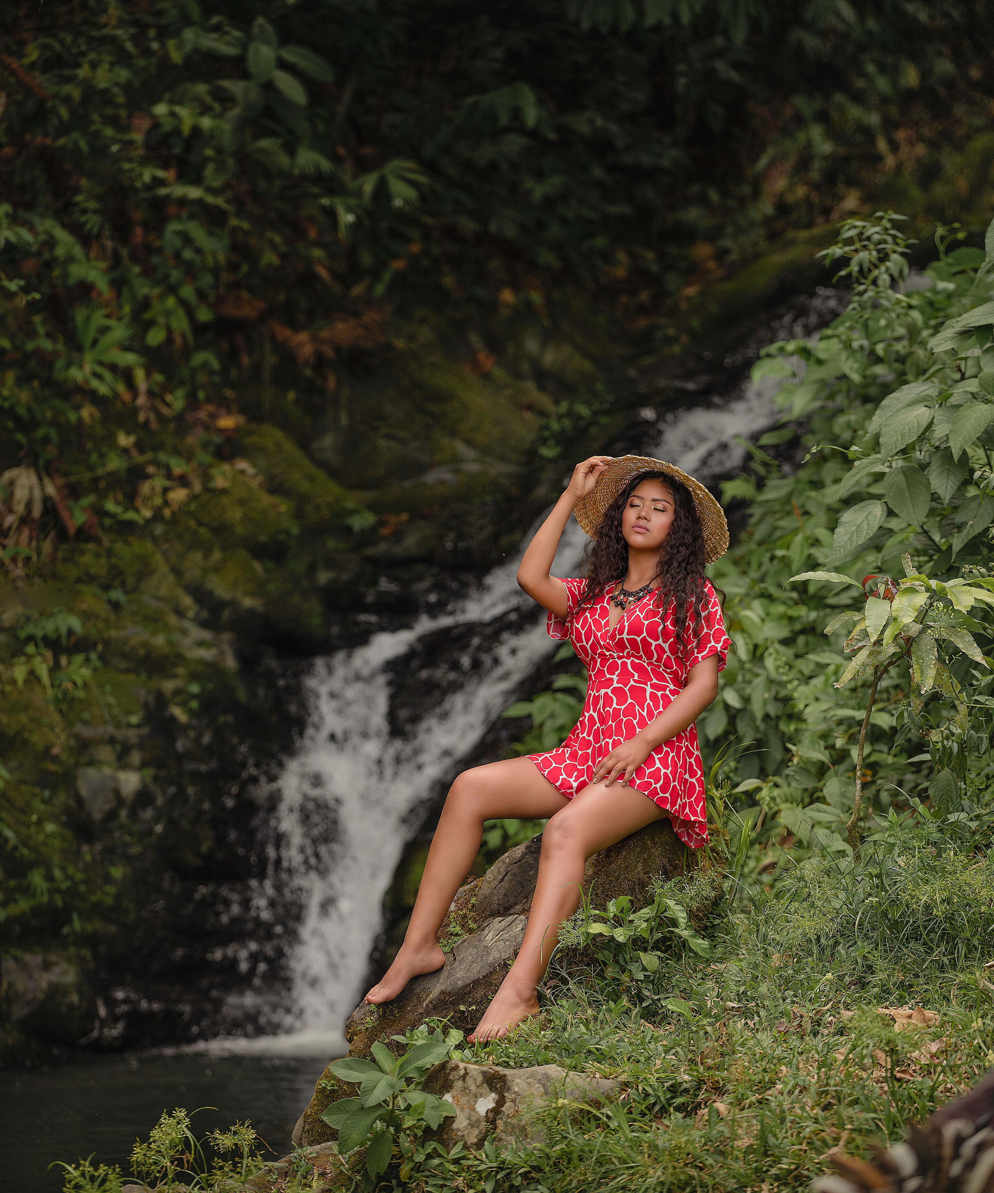 Guest enjoying the natural beauty of Puerto Rico's waterfalls on a Manny's Tours excursion
